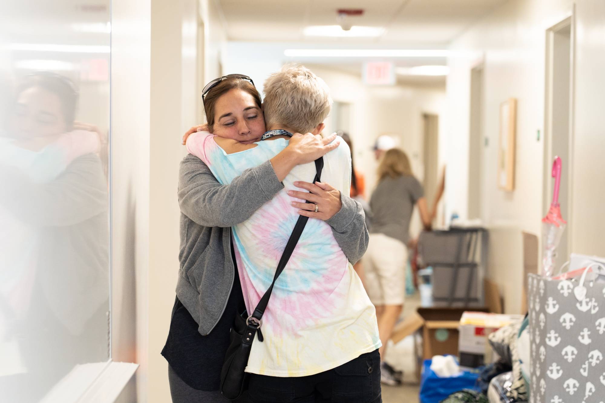 parent and student hugging